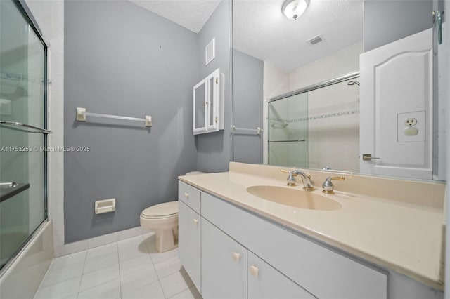 full bathroom featuring a textured ceiling, visible vents, and tile patterned floors