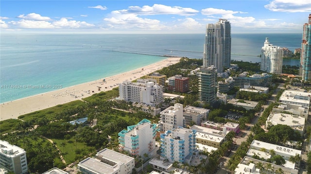 bird's eye view with a view of the beach, a view of city, and a water view