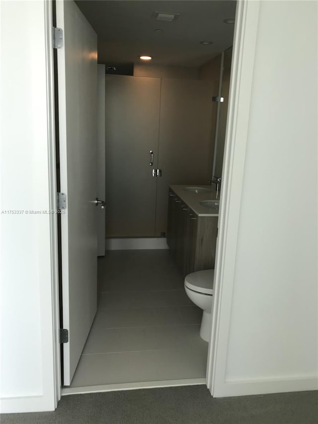 bathroom featuring a sink and toilet
