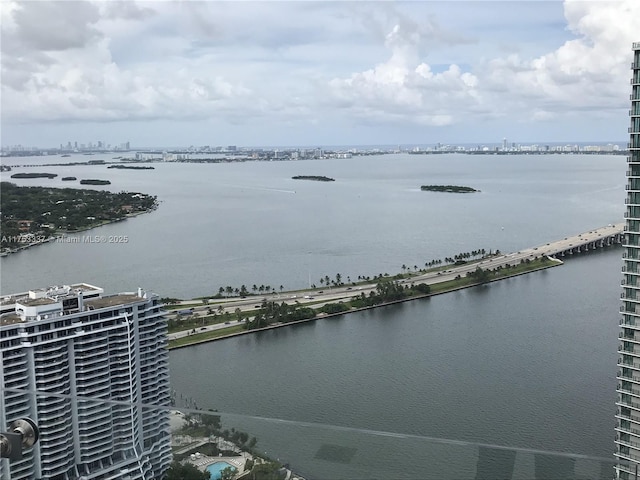 view of water feature with a city view