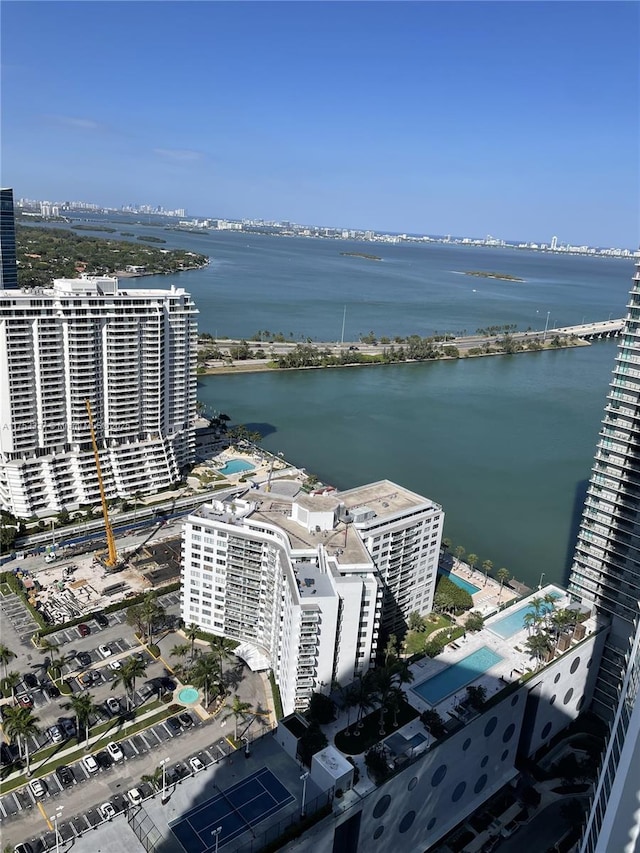 aerial view with a water view and a view of city