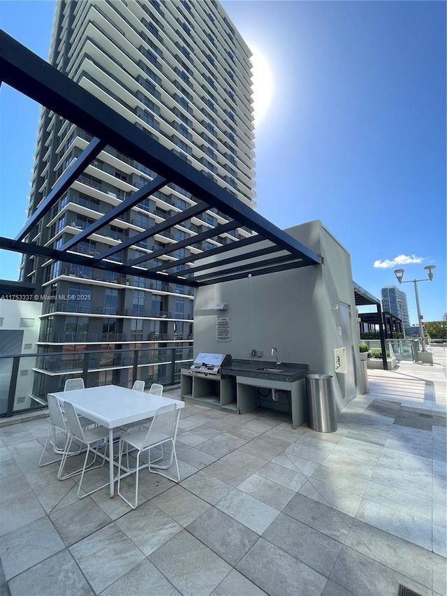 view of patio featuring outdoor dining space