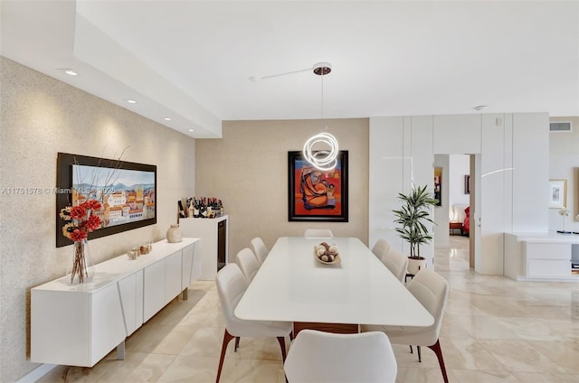 dining space with recessed lighting and visible vents