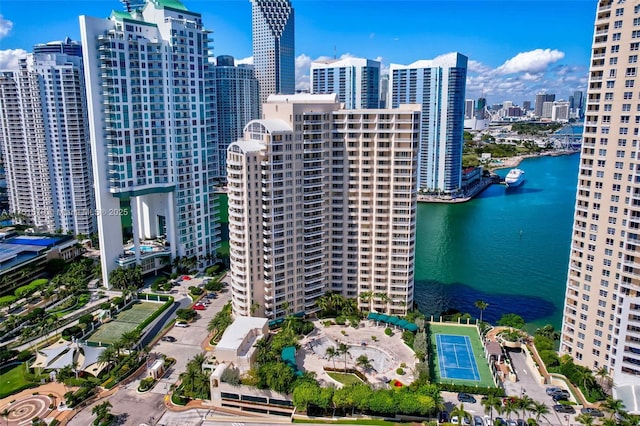 drone / aerial view with a view of city and a water view