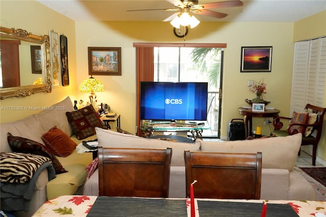 living room featuring a ceiling fan