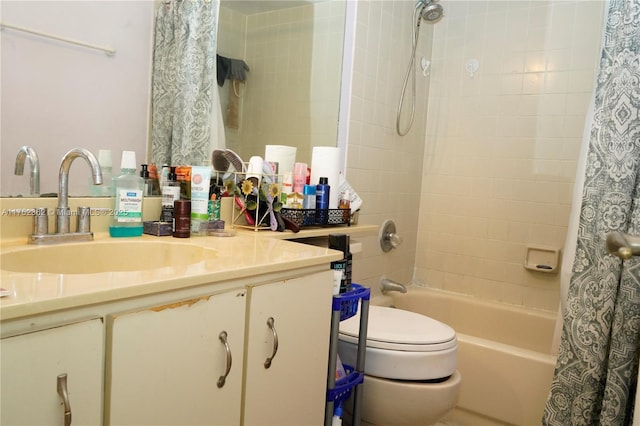 full bath with toilet, shower / bathtub combination with curtain, and vanity