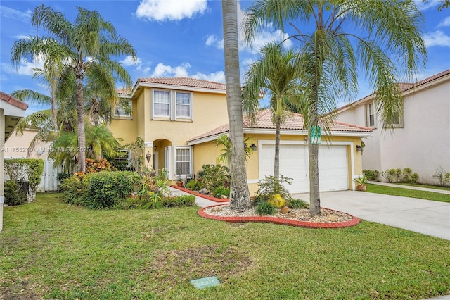 mediterranean / spanish-style house featuring a garage, driveway, a front lawn, and stucco siding