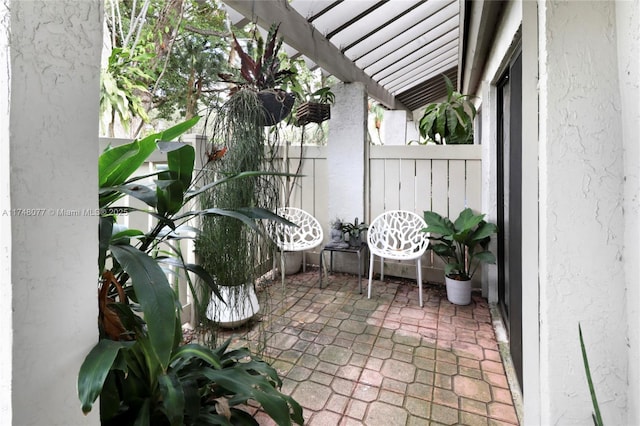 balcony featuring a patio area