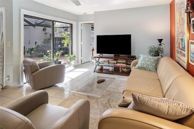 living room with tile patterned floors