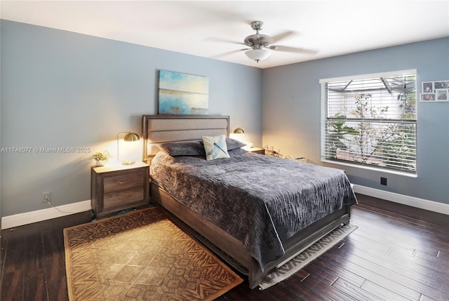 bedroom featuring a ceiling fan, baseboards, and hardwood / wood-style floors