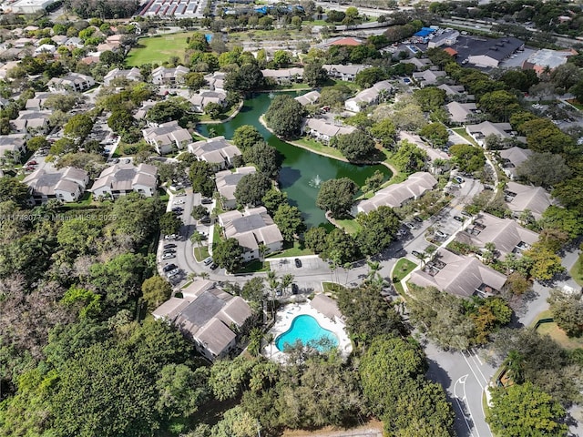 bird's eye view with a water view and a residential view