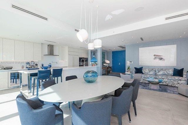 dining room featuring visible vents