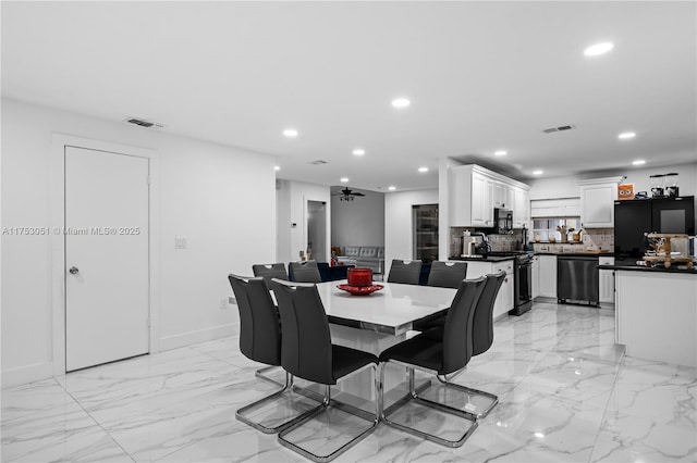 dining space with baseboards, marble finish floor, visible vents, and recessed lighting