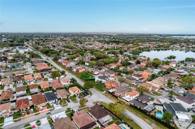 aerial view with a water view and a residential view