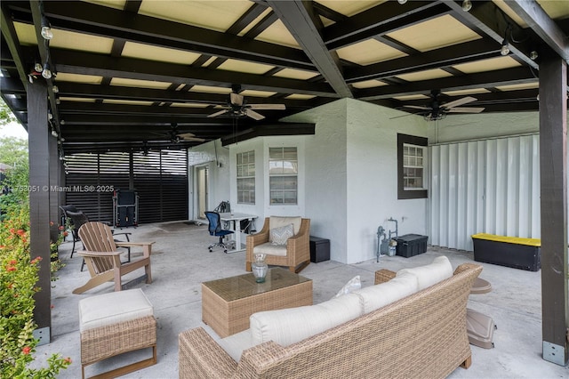 view of patio / terrace featuring ceiling fan and an outdoor living space