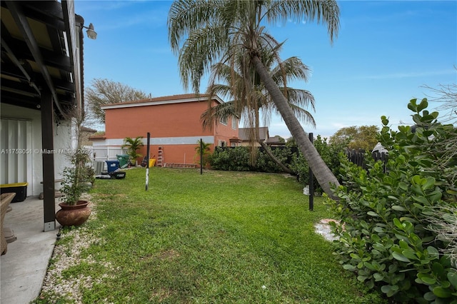 view of yard with fence