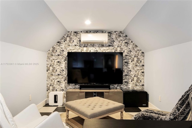 living room with lofted ceiling, a wall mounted air conditioner, and baseboards