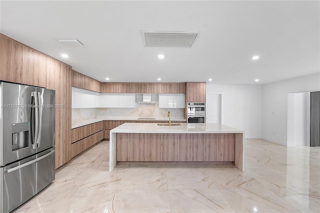 kitchen featuring marble finish floor, appliances with stainless steel finishes, modern cabinets, and visible vents