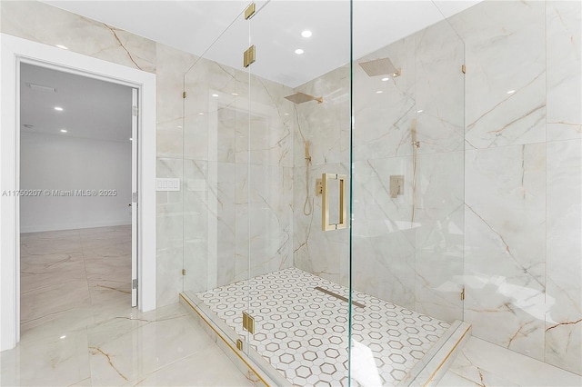 bathroom featuring marble finish floor, a marble finish shower, and recessed lighting