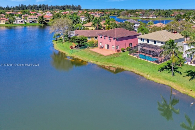 aerial view featuring a water view and a residential view