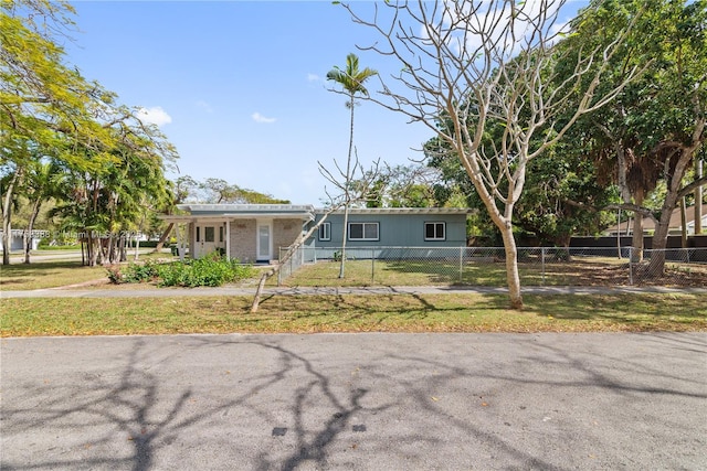 ranch-style home with fence private yard and a front yard