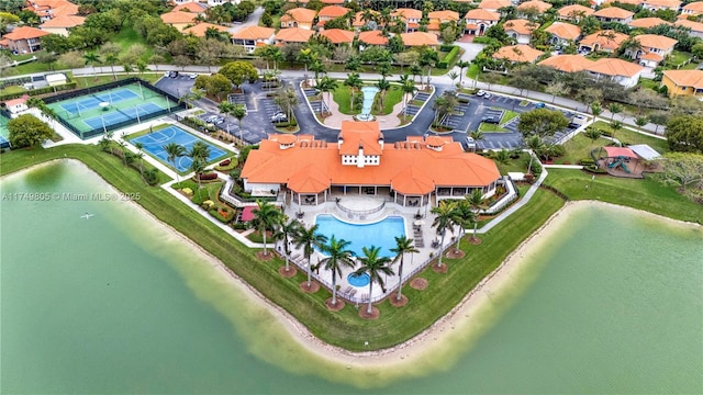 aerial view featuring a residential view and a water view