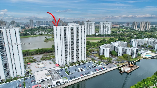 drone / aerial view with a water view and a view of city