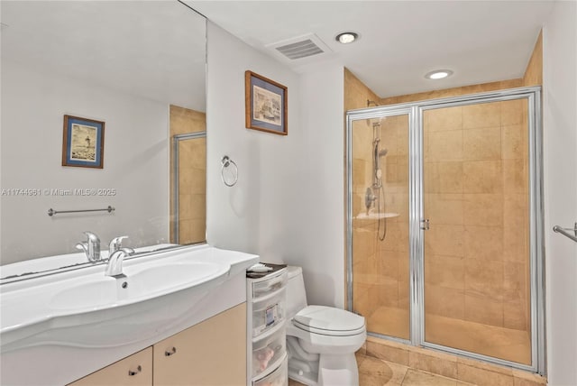 full bath with toilet, a stall shower, visible vents, and tile patterned floors