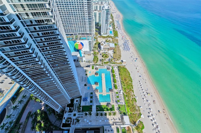 drone / aerial view with a view of the beach and a water view