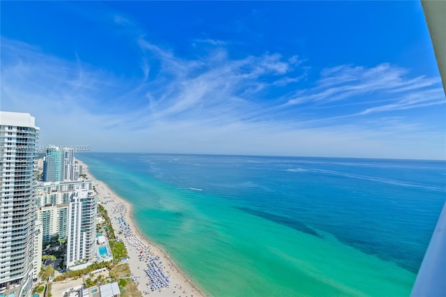 property view of water featuring a view of the beach and a city view