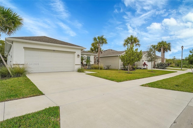 3705 Bennington Ln, Fort Pierce, FL 34981 - view of front of house with driveway, a front lawn, stucco siding, and a garage