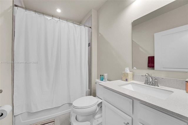 full bathroom featuring toilet, shower / tub combo, and vanity