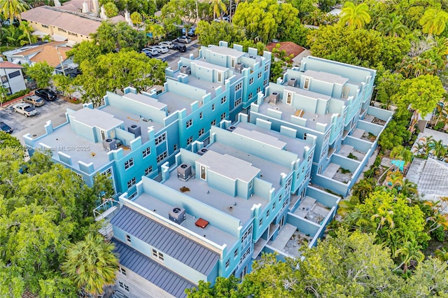 birds eye view of property with a residential view