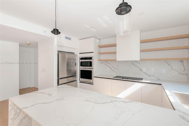 kitchen featuring visible vents, white cabinets, appliances with stainless steel finishes, open shelves, and modern cabinets