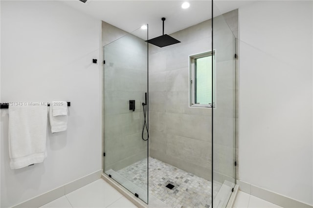 bathroom featuring a stall shower, recessed lighting, baseboards, and tile patterned floors