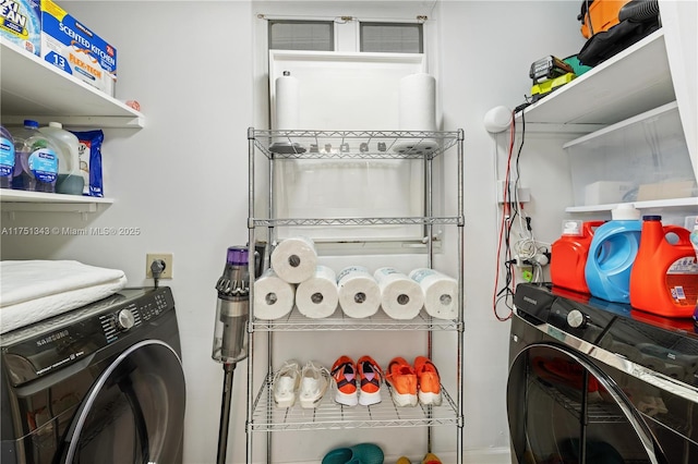 washroom with laundry area and washer / clothes dryer