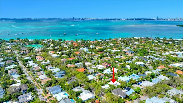 bird's eye view with a water view and a residential view