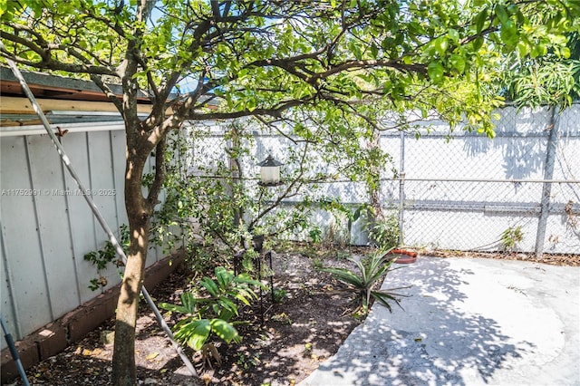 view of patio / terrace featuring fence