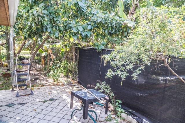 view of patio / terrace featuring fence