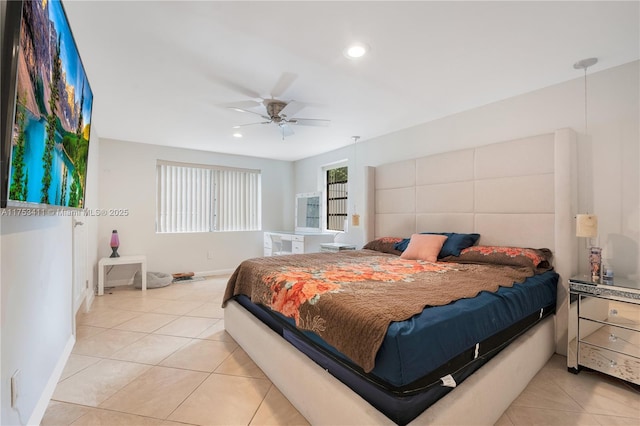 bedroom featuring a ceiling fan, recessed lighting, light tile patterned flooring, and baseboards