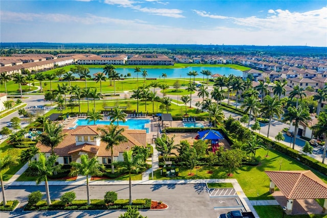 aerial view with a water view and a residential view