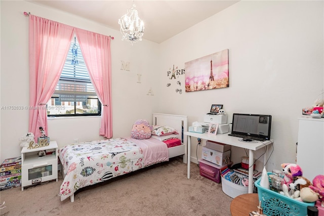 bedroom with a chandelier and carpet flooring