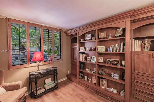 1698 S Ocean Ln Unit 171, Fort Lauderdale, FL 33316 - sitting room featuring baseboards and wood finished floors