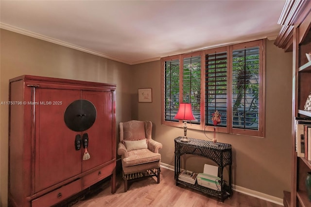 1698 S Ocean Ln Unit 171, Fort Lauderdale, FL 33316 - sitting room with crown molding, baseboards, and wood finished floors