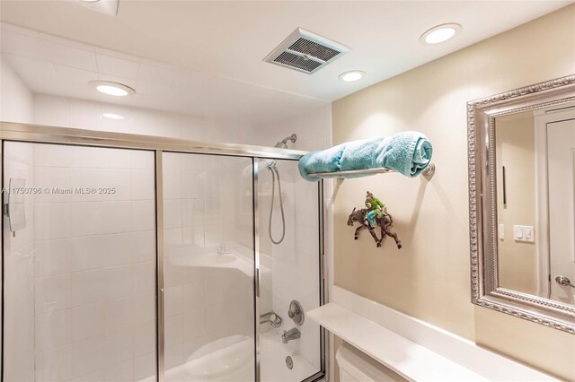 1698 S Ocean Ln Unit 171, Fort Lauderdale, FL 33316 - bathroom featuring visible vents, recessed lighting, combined bath / shower with glass door, and toilet