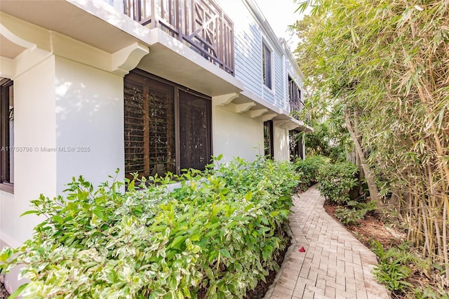 1698 S Ocean Ln Unit 171, Fort Lauderdale, FL 33316 - view of property exterior with stucco siding and a balcony