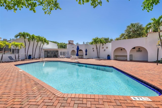 view of pool featuring a fenced in pool, a patio, and fence