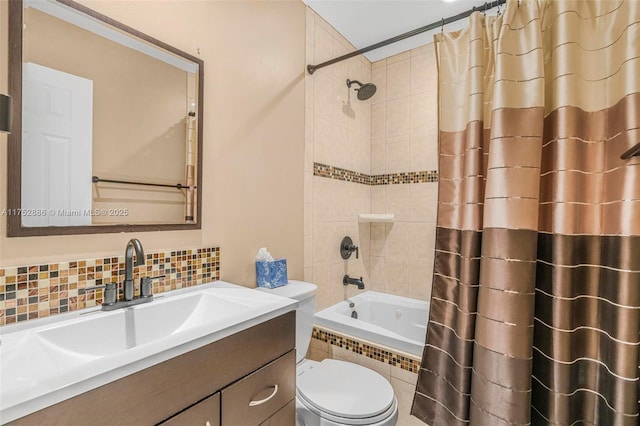 full bathroom featuring vanity, shower / bath combo with shower curtain, backsplash, and toilet