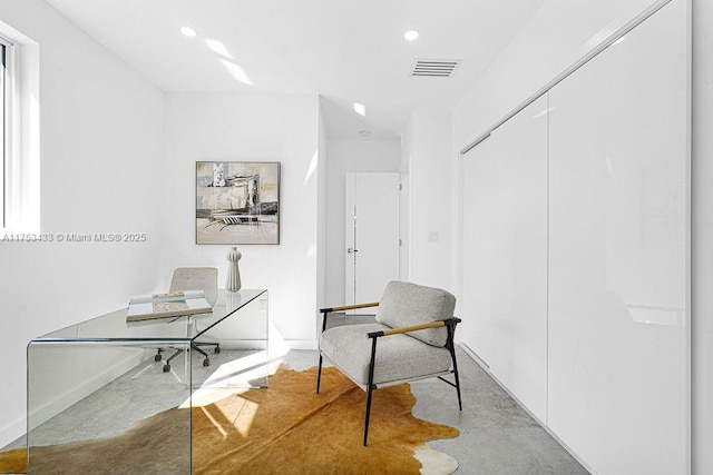 office space with visible vents, concrete flooring, and recessed lighting