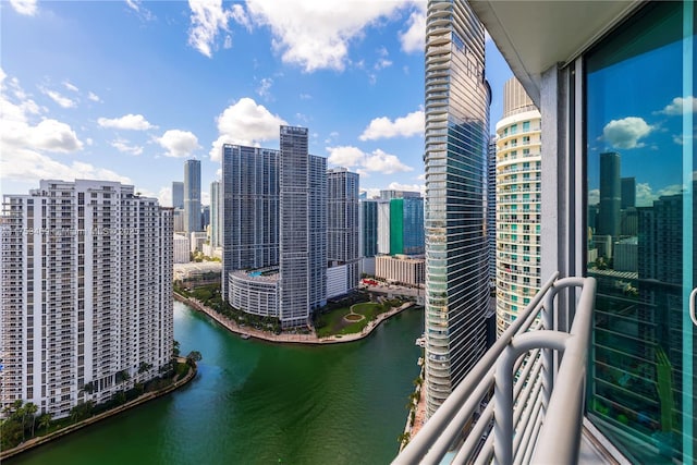 property's view of city featuring a water view